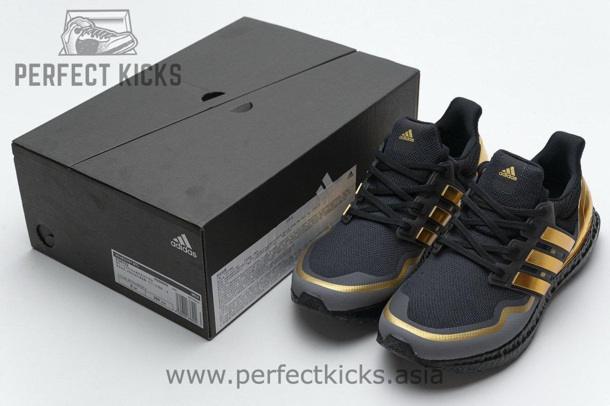 eg8102 Ad*s ultra boost black gold